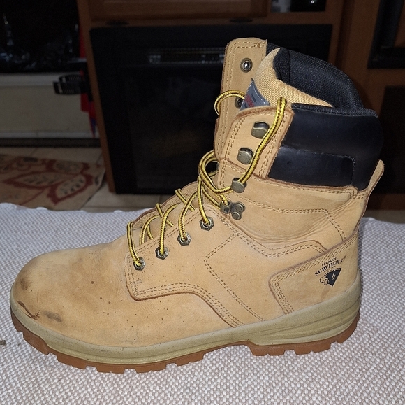 A pair of Herman Survivors leather boots in a men's size 11.5 Wide. Safety Toe. - Picture 2 of 12